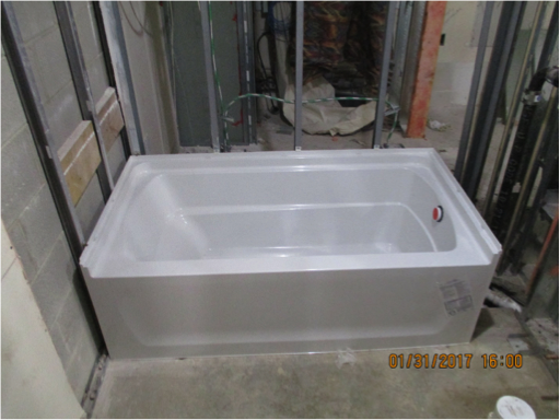 bath tub in the middle of construction area
