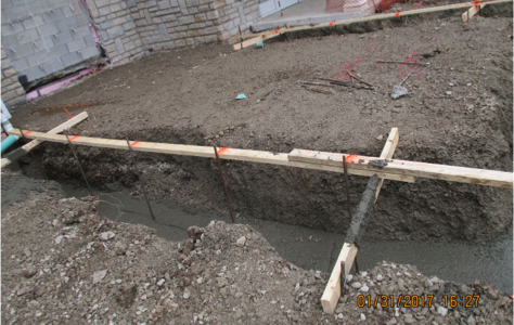 Dig and pour footers and start CMU foundation