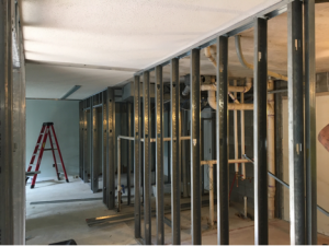 Construction in the arts-and-crafts room metal frame is up