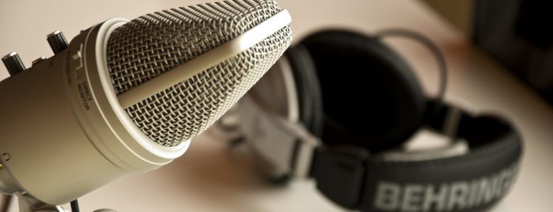 microphone and headphones sitting on a table