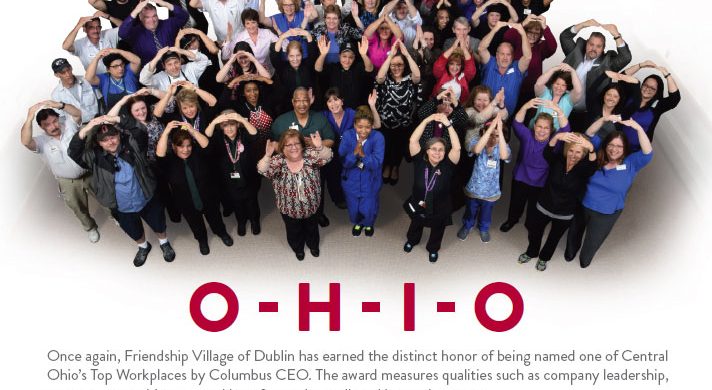 Group of people spelling out "O-H-I-O" with their arms