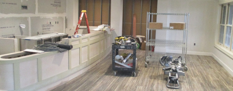 Construction process with ladder and tools in frame