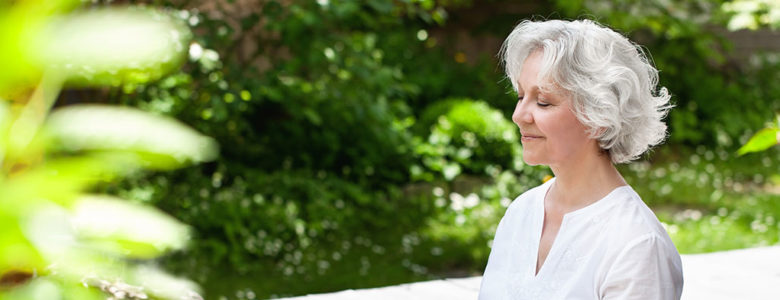 Older woman meditating