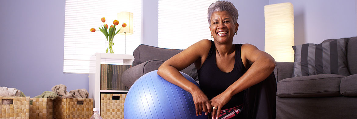 Senior woman with exercise ball