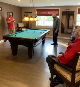 men playing billiards