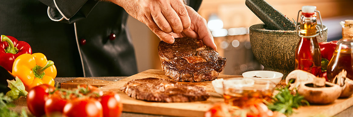 chef hands preparing meal