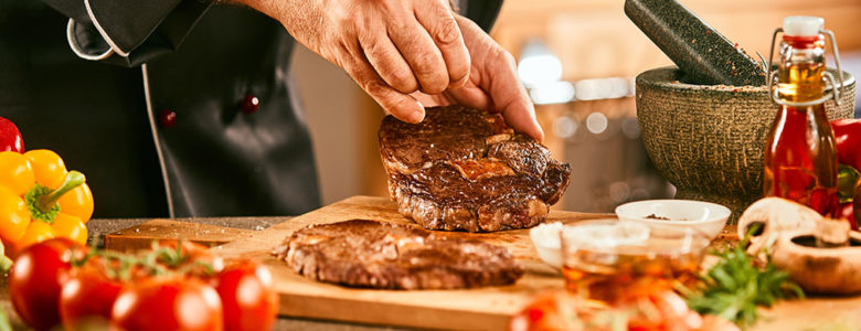 chef hands preparing meal