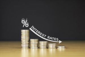 graphic shows low interest rates with stacks of coins