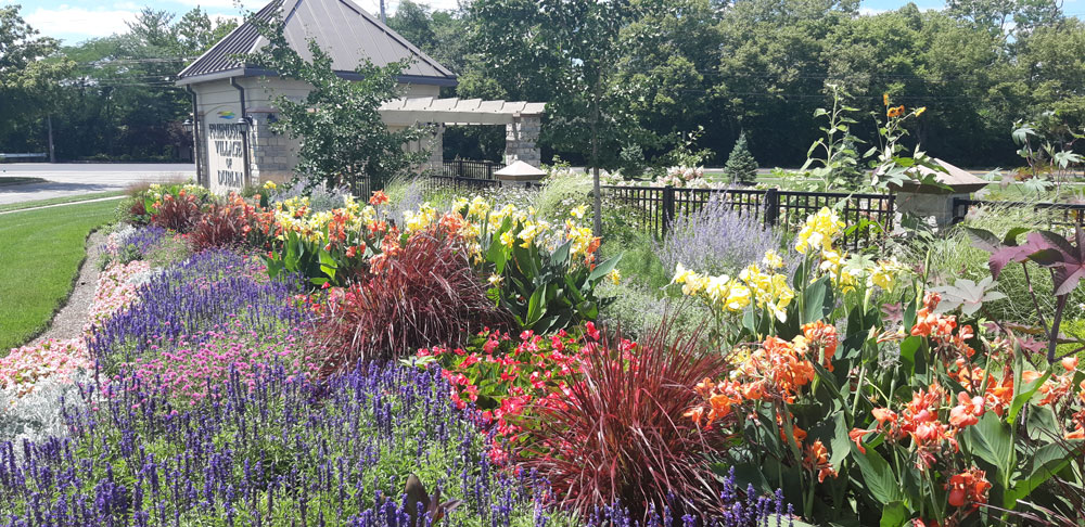 Bright flowers near the main entrance enhance environmental wellness