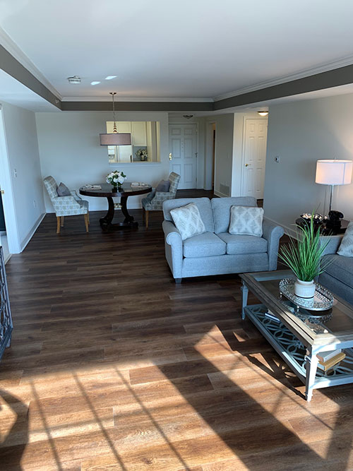 Bay window throws sunlight across spacious living room in Carrigan 2 floor plan