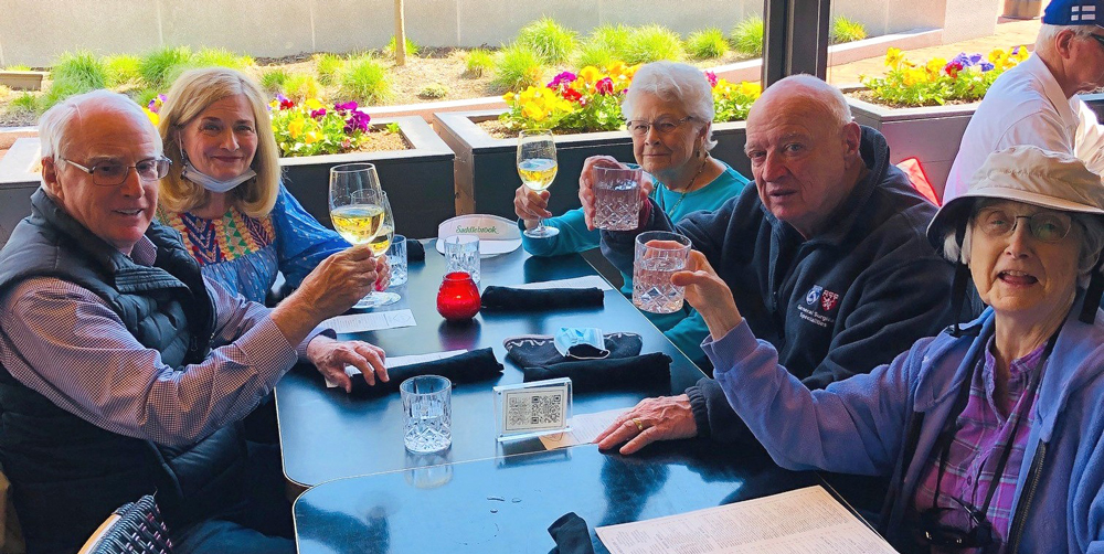 columbus seniors raise a glass while dining out
