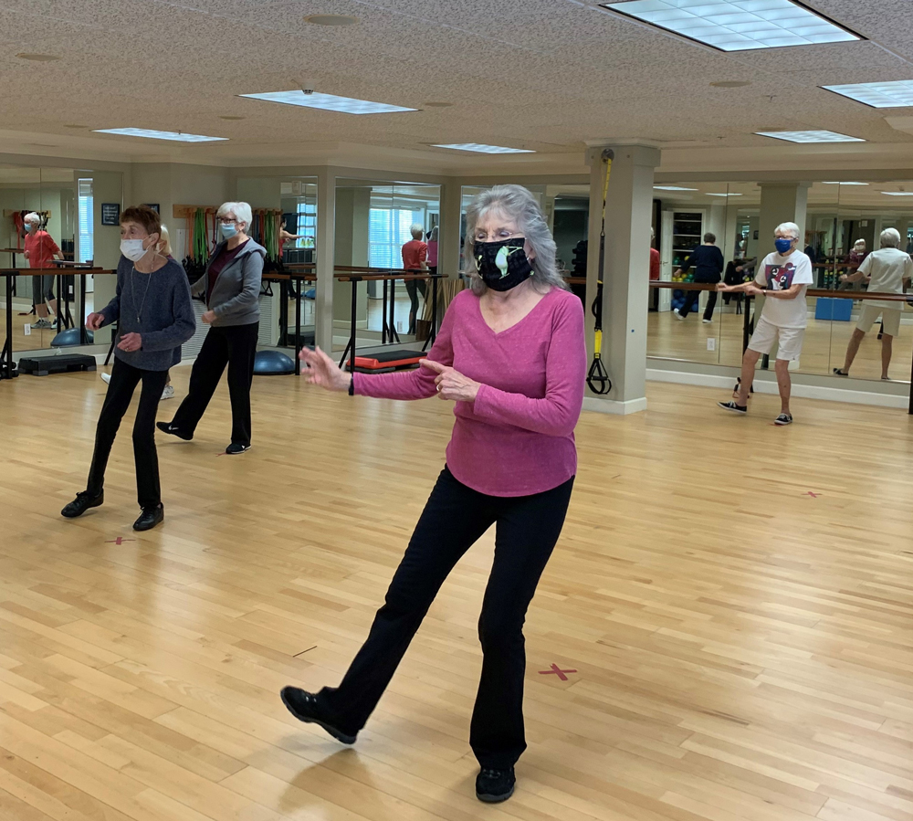 Seniors working out to increase physical fitness