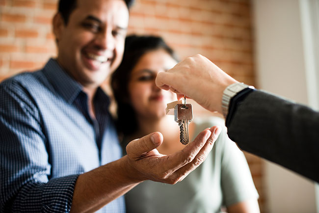 Couple with key to new home