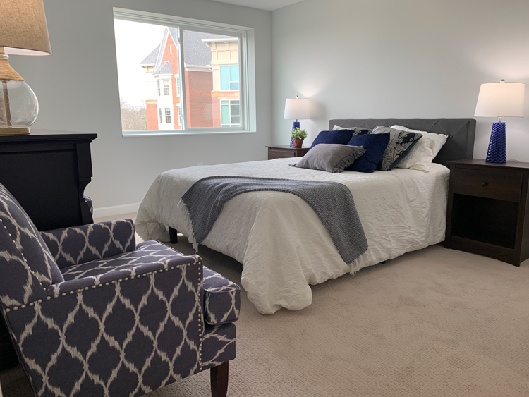 Primary bedroom in The Declan II independent living apartment
