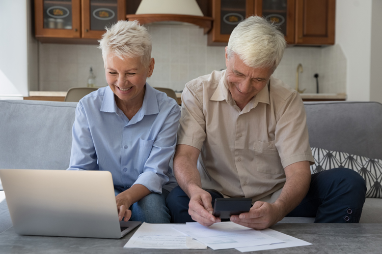 senior couple making a budget