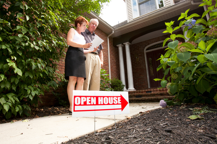 older man house hunting with realtor
