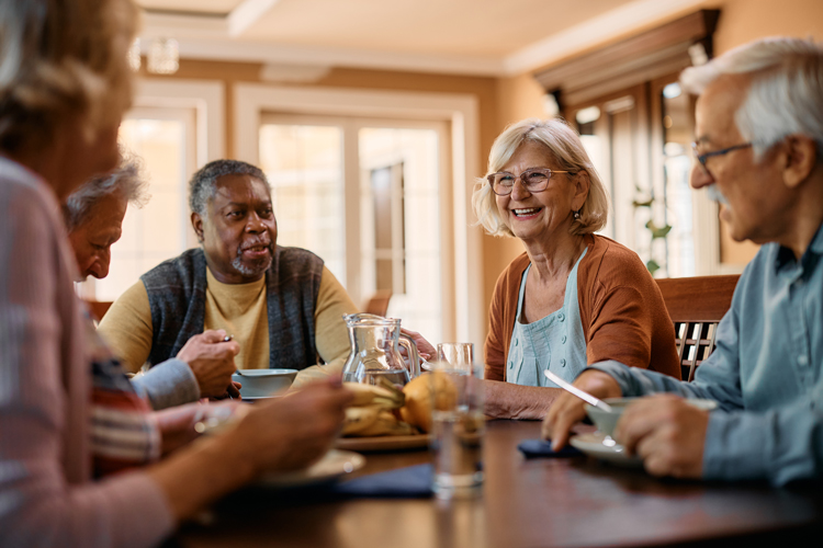 senior couples entertaining at home
