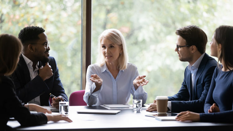 Female solo ager consulting with advisors