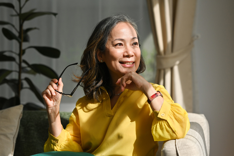 Thoughtful senior woman pondering senior living options