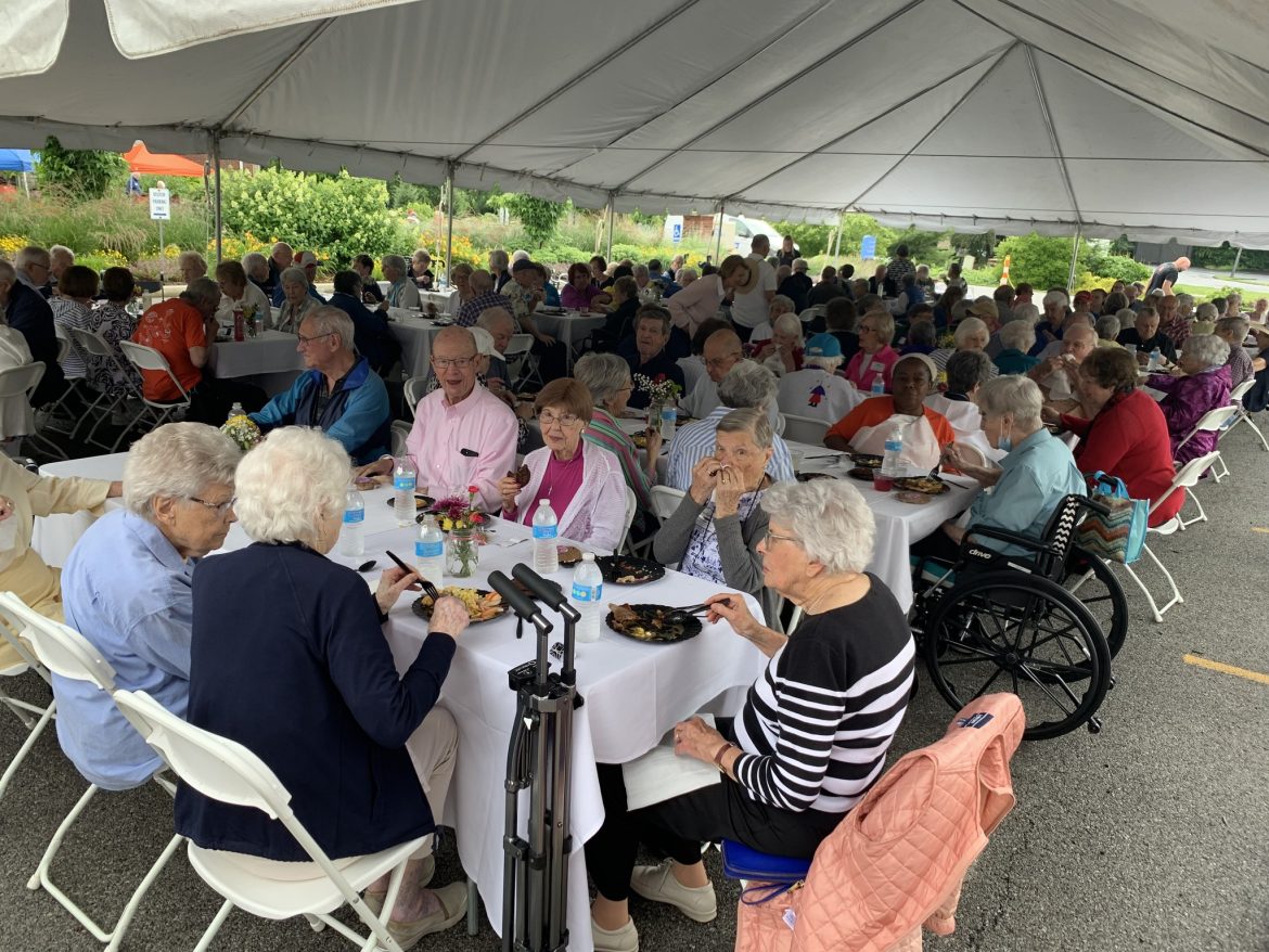 Residents socialize at the 2023 summer picnic at Friendship VIllage of Dublin.