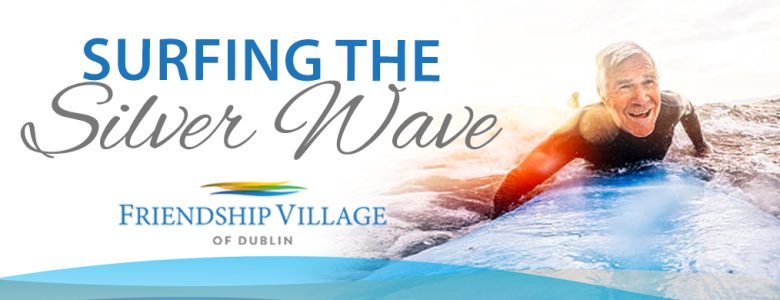 Graphic with an older man on a surfboard with the text "Surfing the Silver Wave"