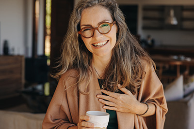 Cheerful senior woman who's aging in place.