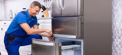 Appliance repairman in a senior's home