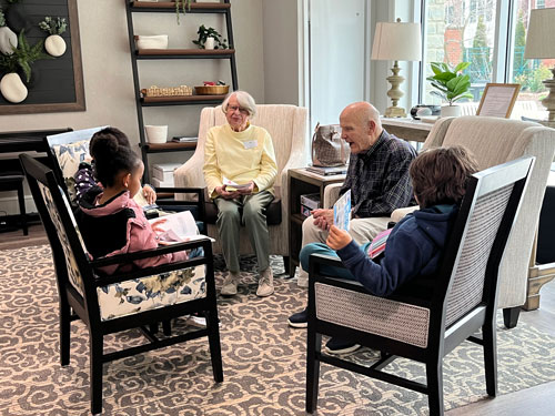 Young people volunteering with seniors