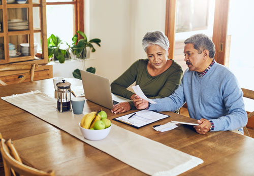 older hispanic couple planning for retirement