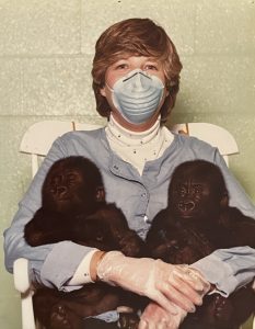 Volunteer Sue A. with twin gorilla babies at the Columbus Zoo