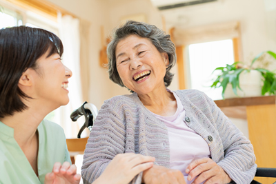 Older woman with her daughter caregiver