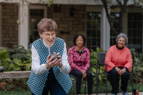 Woman playing bocce at Friendship Village of Dublin