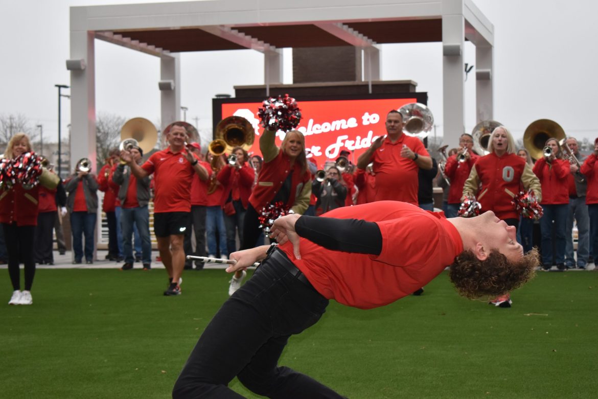 Baton twirler in front of The Best Damn Band in the Land at The Bailely at Bridge Park.