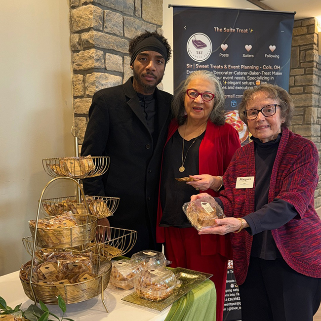 Sir Allen of The Suite Treat in Pickerington, Ohio, with a pair of Friendship Village of Dublin Residents.