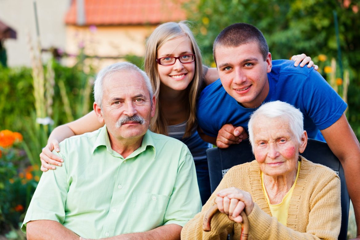Two generations of family with a woman who is living with dementia.